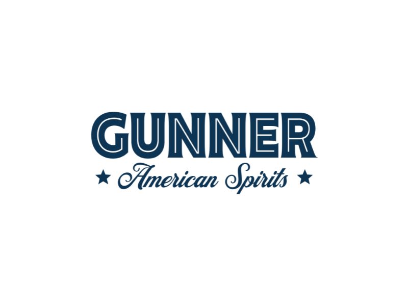Gunner American Spirits Logo with the word GUNNER in bold blue uppercase letters above the phrase American Spirits in cursive, flanked by two stars, all on a white background.