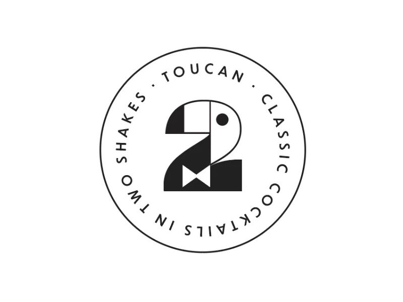 Toucan Cocktails Black-and-white logo featuring a stylized number 2 resembling a toucan, surrounded by the text TOUCAN · CLASSIC COCKTAILS IN TWO SHAKES in a circular border.